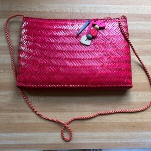 Vintage, handwoven red wooden shoulder bag with wood toggles